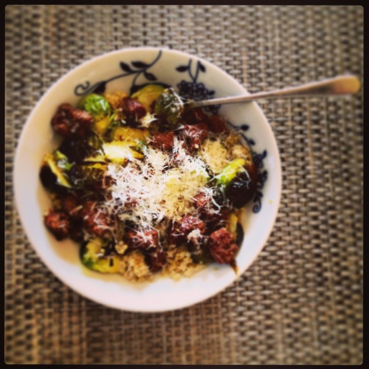 Dinner of Mint Creek Farm's lamb sausage and Roasted brussel sprouts over Quinoa with a dusting of parmesan. So good. 